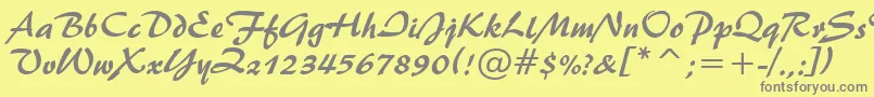 フォントBrush445Bt – 黄色の背景に灰色の文字