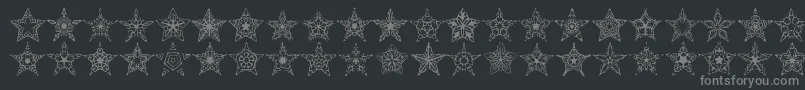 90stars-Schriftart – Graue Schriften auf schwarzem Hintergrund
