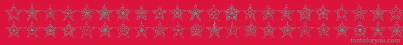 Fonte 90stars – fontes cinzas em um fundo vermelho