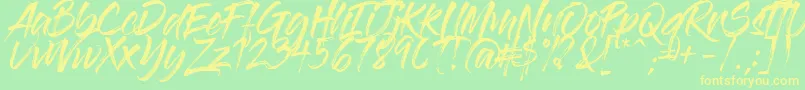 GlossAndBloom Font – Yellow Fonts on Green Background