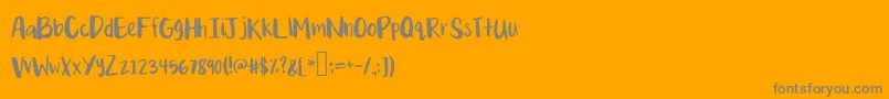 Mixquixotic-Schriftart – Graue Schriften auf orangefarbenem Hintergrund