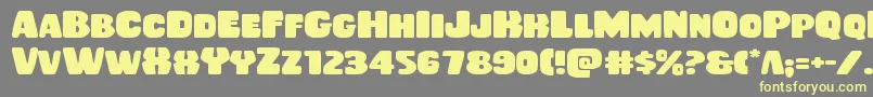 Rubberboyexpand Font – Yellow Fonts on Gray Background