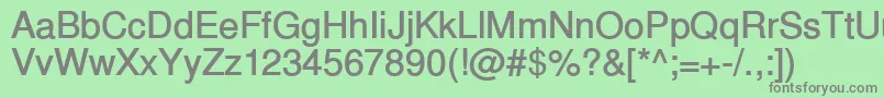 フォントInuktitutsskBold – 緑の背景に灰色の文字