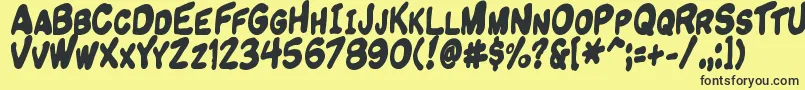 Komikandy Font – Black Fonts on Yellow Background