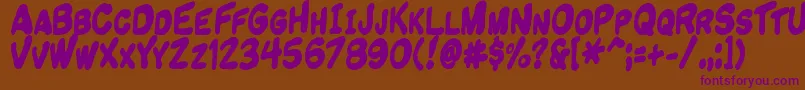 Komikandy Font – Purple Fonts on Brown Background