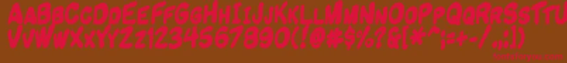 Komikandy Font – Red Fonts on Brown Background