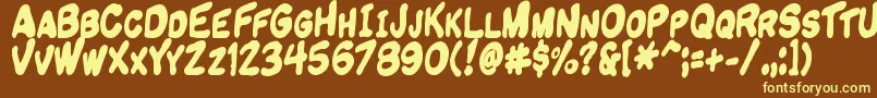Komikandy Font – Yellow Fonts on Brown Background