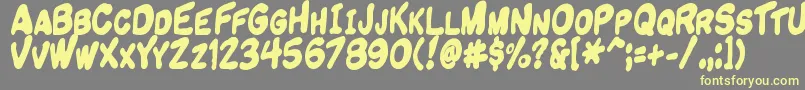 Komikandy Font – Yellow Fonts on Gray Background