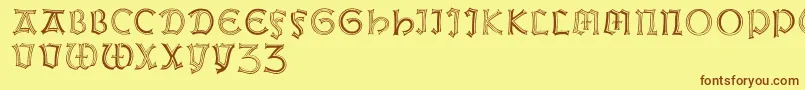 フォントWeissgotnitials – 茶色の文字が黄色の背景にあります。