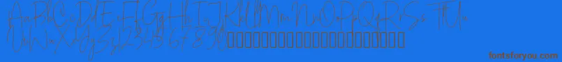 フォントWhiteApparel – 茶色の文字が青い背景にあります。