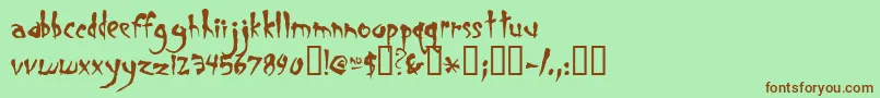 Smegalomania Font – Brown Fonts on Green Background