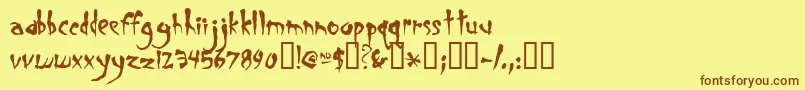 Smegalomania Font – Brown Fonts on Yellow Background