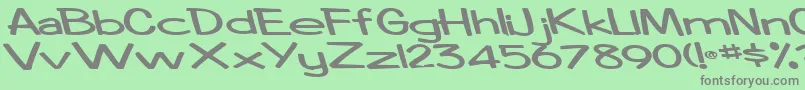 Boosterrocketlight83Bold Font – Gray Fonts on Green Background