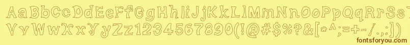 フォントDorkyDeluxe – 茶色の文字が黄色の背景にあります。
