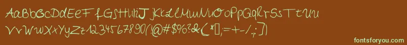 フォントMyfirsthandwriting – 緑色の文字が茶色の背景にあります。