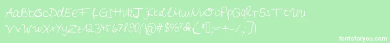 Czcionka Myfirsthandwriting – białe czcionki na zielonym tle