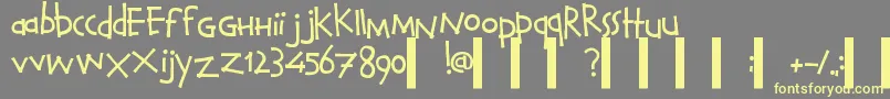CalvinAndHobbesNormal-fontti – keltaiset fontit harmaalla taustalla