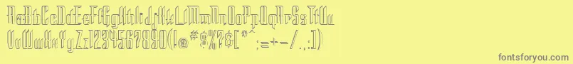 フォントStoneRegular – 黄色の背景に灰色の文字