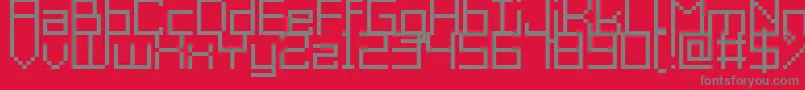GrixelAcme9Regular-fontti – harmaat kirjasimet punaisella taustalla