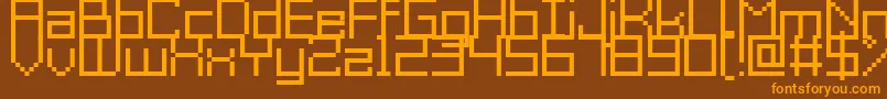 GrixelAcme9Regular Font – Orange Fonts on Brown Background