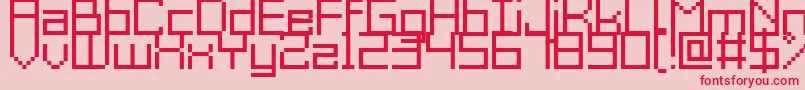 GrixelAcme9Regular-fontti – punaiset fontit vaaleanpunaisella taustalla