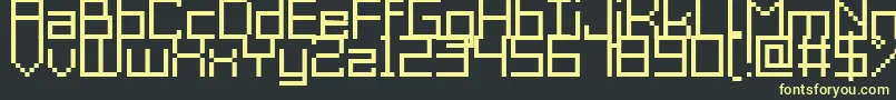 フォントGrixelAcme9Regular – 黒い背景に黄色の文字
