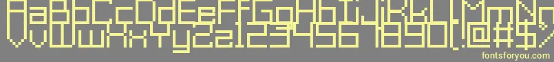 Шрифт GrixelAcme9Regular – жёлтые шрифты на сером фоне