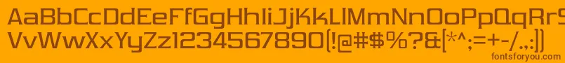 フォントVibrocentricRg – オレンジの背景に茶色のフォント