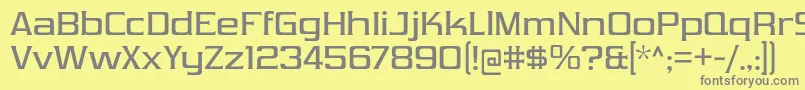 VibrocentricRg Font – Gray Fonts on Yellow Background