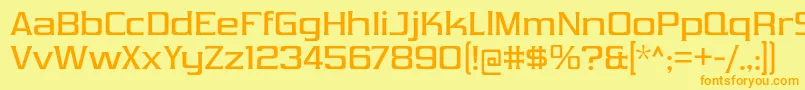 フォントVibrocentricRg – オレンジの文字が黄色の背景にあります。