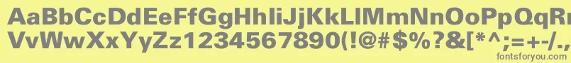 NajinskiBlackNormal Font – Gray Fonts on Yellow Background