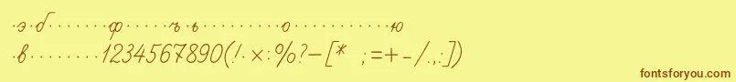 フォントPropisic – 茶色の文字が黄色の背景にあります。