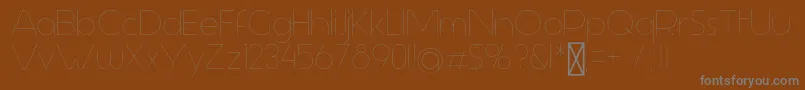 AspergitLight-fontti – harmaat kirjasimet ruskealla taustalla