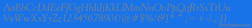 フォントVaniel2Italic – 青い背景に灰色の文字