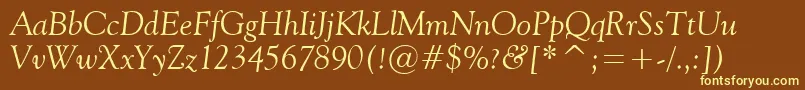 Vaniel2Italic-fontti – keltaiset fontit ruskealla taustalla