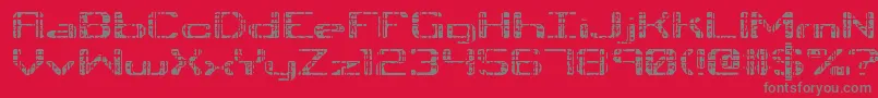 TonikBrk-fontti – harmaat kirjasimet punaisella taustalla
