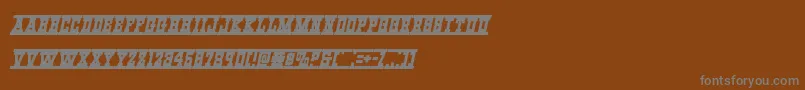 Westernrailital-Schriftart – Graue Schriften auf braunem Hintergrund