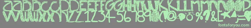 Misunderstood-Schriftart – Grüne Schriften auf grauem Hintergrund