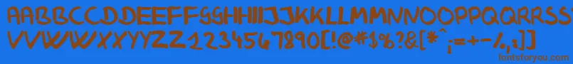 フォントKlausj – 茶色の文字が青い背景にあります。