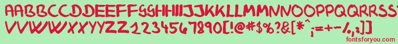 Klausj Font – Red Fonts on Green Background