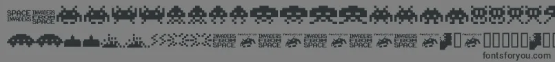 フォントInvaders.From.Space.Fontvir.Us – 黒い文字の灰色の背景