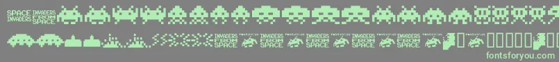 フォントInvaders.From.Space.Fontvir.Us – 灰色の背景に緑のフォント