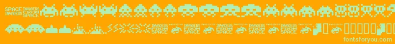 Invaders.From.Space.Fontvir.Us-Schriftart – Grüne Schriften auf orangefarbenem Hintergrund