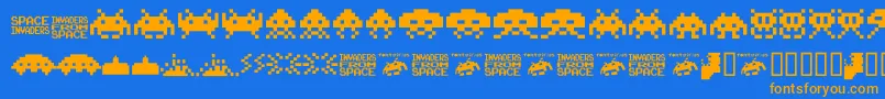 Invaders.From.Space.Fontvir.Us-Schriftart – Orangefarbene Schriften auf blauem Hintergrund