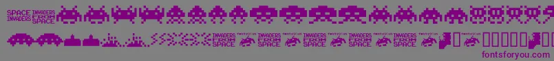Шрифт Invaders.From.Space.Fontvir.Us – фиолетовые шрифты на сером фоне