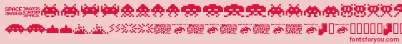 フォントInvaders.From.Space.Fontvir.Us – ピンクの背景に赤い文字