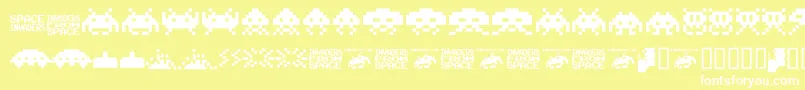 Шрифт Invaders.From.Space.Fontvir.Us – белые шрифты на жёлтом фоне