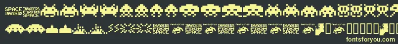 Шрифт Invaders.From.Space.Fontvir.Us – жёлтые шрифты на чёрном фоне