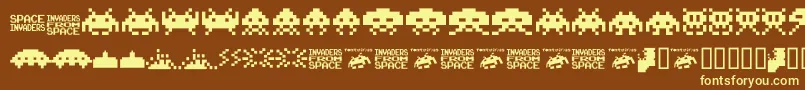 Invaders.From.Space.Fontvir.Us-Schriftart – Gelbe Schriften auf braunem Hintergrund