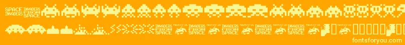 Шрифт Invaders.From.Space.Fontvir.Us – жёлтые шрифты на оранжевом фоне